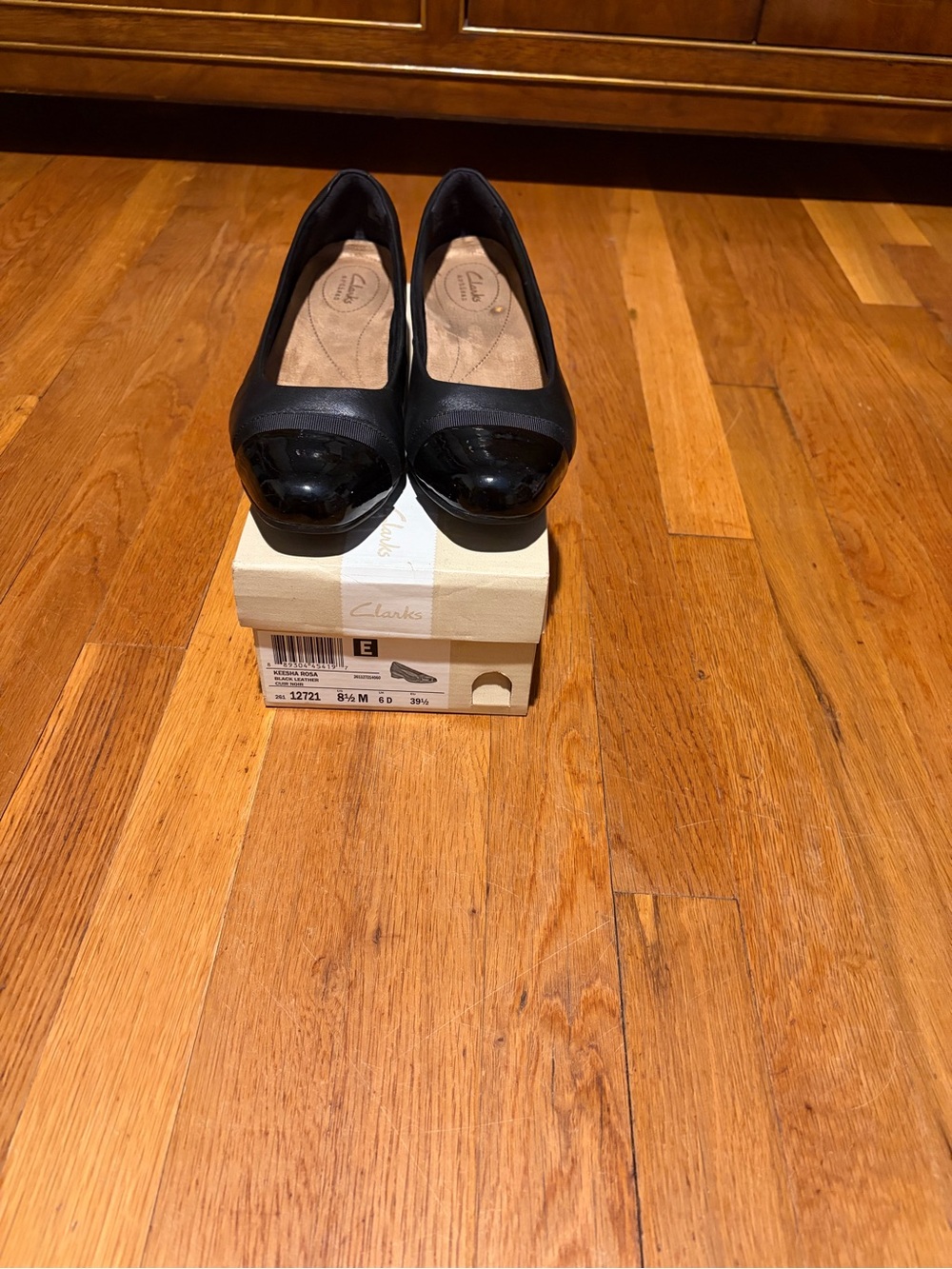 Clarks Black Leather Flats with Patent Cap Toe